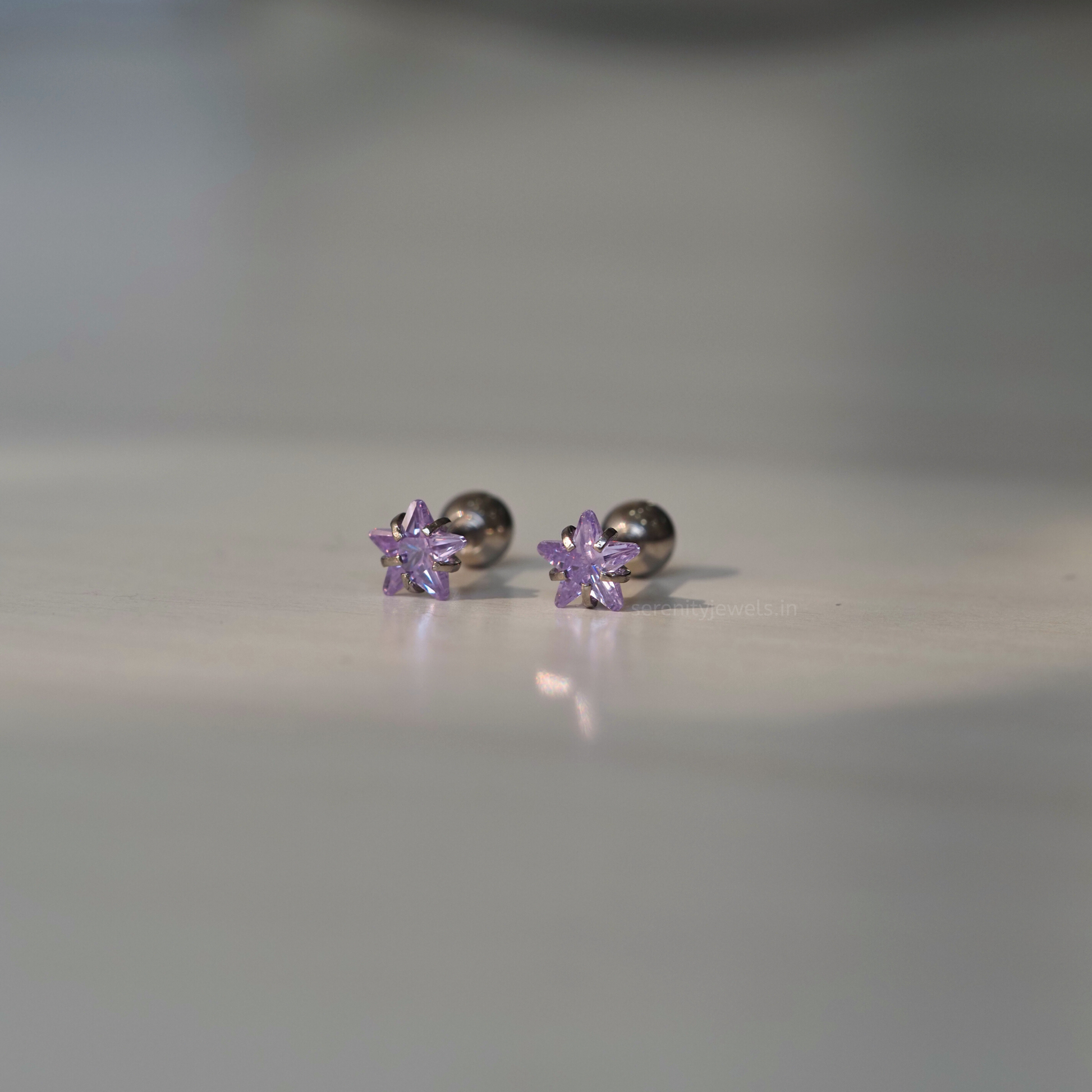 Purple Solitaire Star Studs - Pair