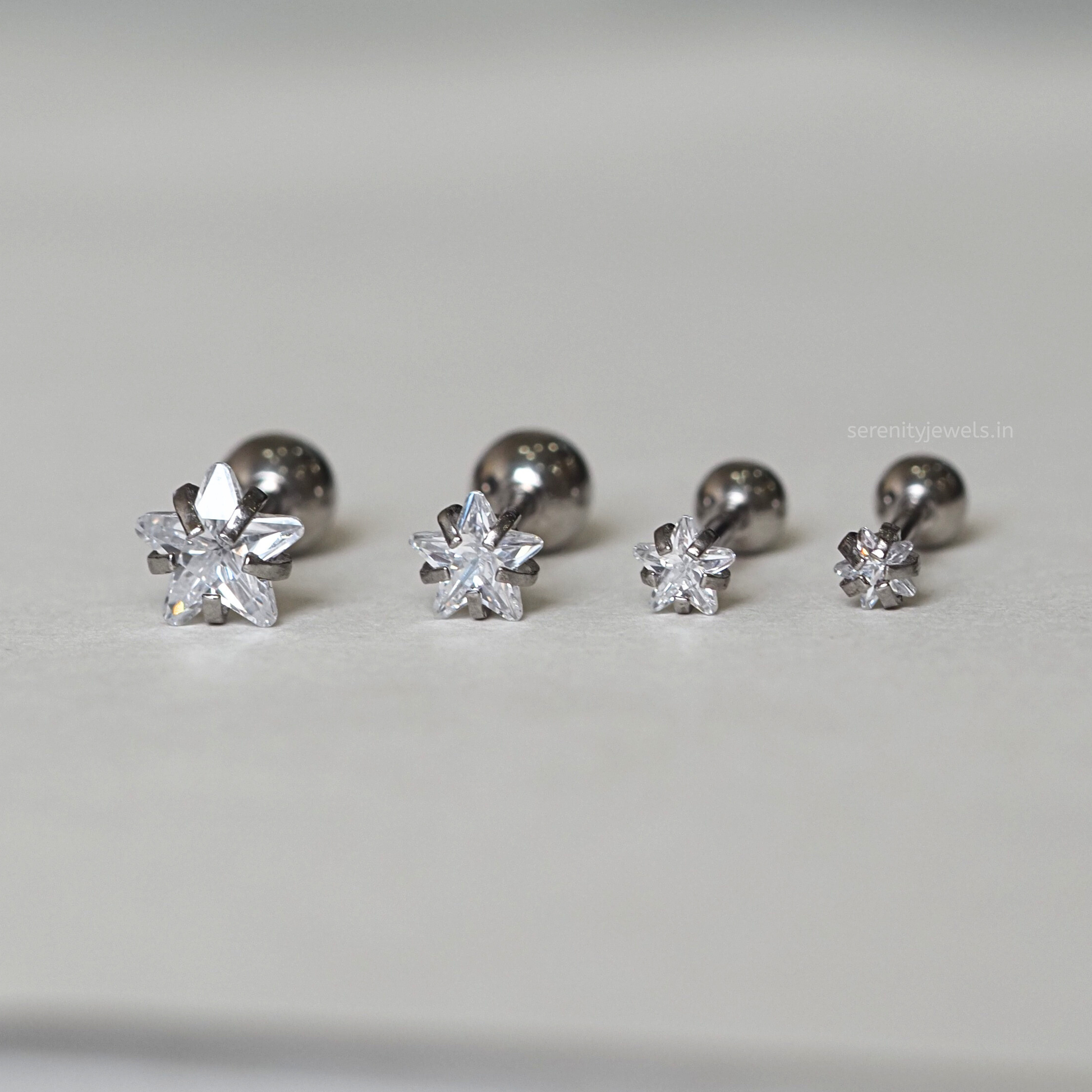 Solitaire Star Studs - PAIR