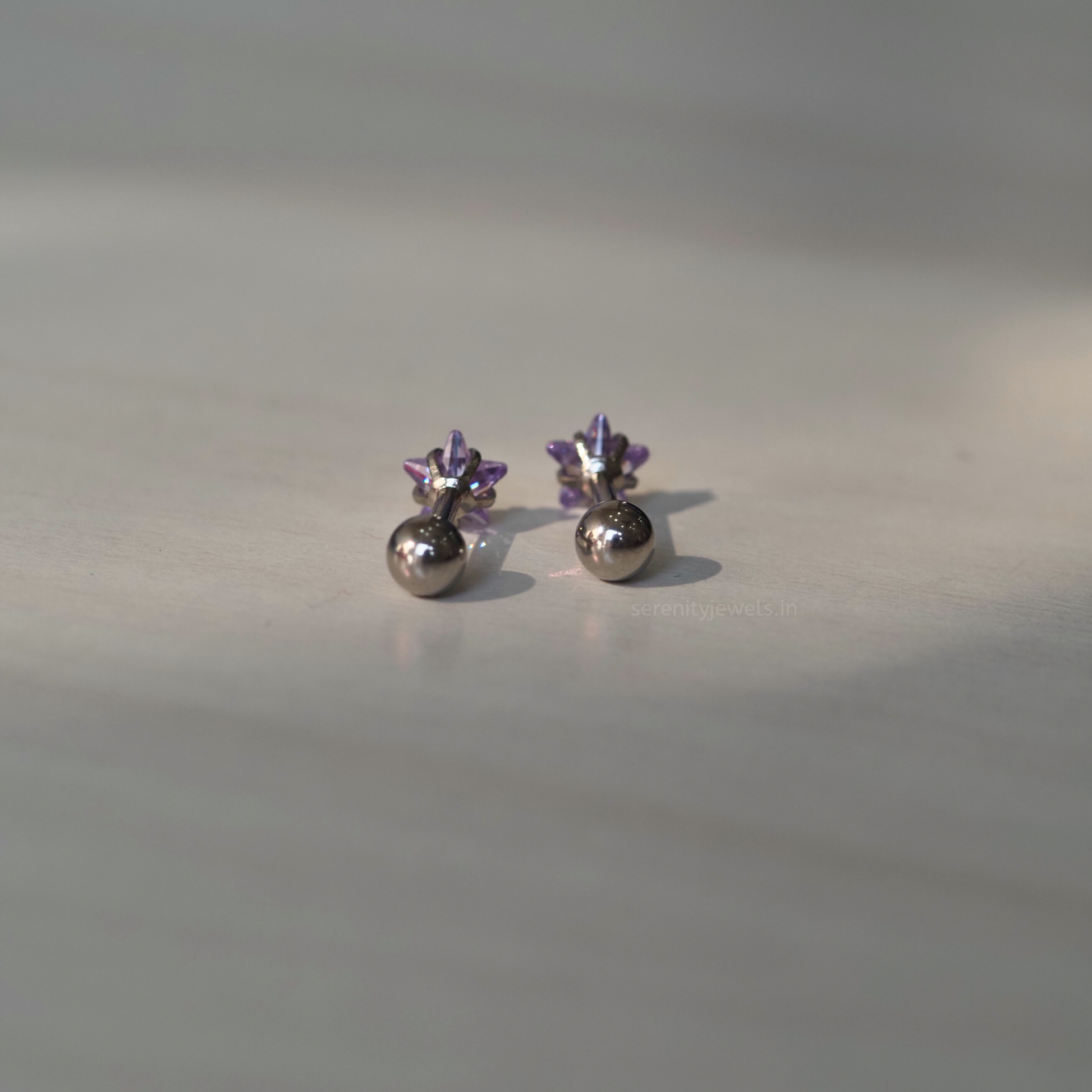 Purple Solitaire Star Studs - Pair