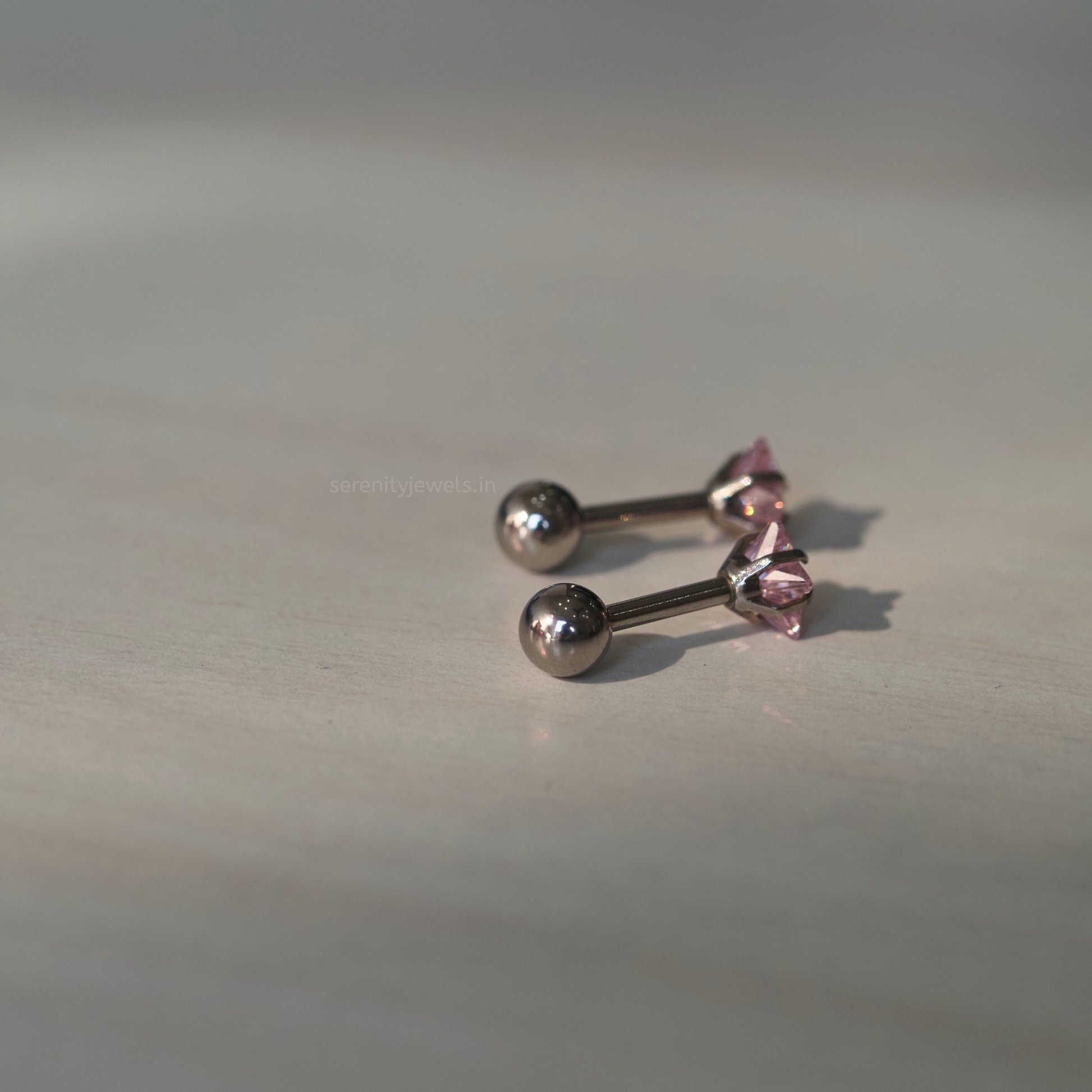 Pink Solitaire Star Studs - Pair